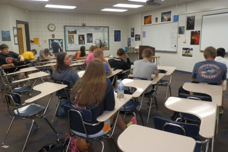 Mrs. Phillips 4th hour Senior Literature class sits quietly as the room of 30 is down to a startling 13 students caused by the horrific events that happened over the weekend. 