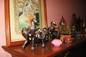 My parents try to keep Indian culture alive in ourhouse, and decor is a big part of that. Along with the usual family portraits and vacation souvenirs displayed in any home, we have representations of Hindu gods and dozens of elephant statues. On the mantle in my living room, two Indian wedding elephant statues march in front of a framed picture of Krishna and Radha, two prominent gods.

The other statues along the mantle are of Ganesh, the God of wisdom; Lakshmi, Goddess of wealth and prosperity; Jagannath, Balbhadra and Subhadra.
