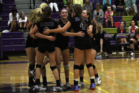 The team celebrates a point during their game against Cor Jesu, Sept. 17.