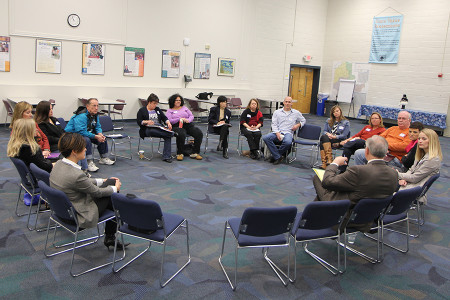 Fifteen community members listen intently to Dr. Dennis Fisher, School Exec Connect Associate, as he asks his fourth question about the ideal skill set for a future superintendent, Jan. 13. The stakeholders took the initiative and contributed to the superintendent search by attending the open forum at the Administrative Annex.
