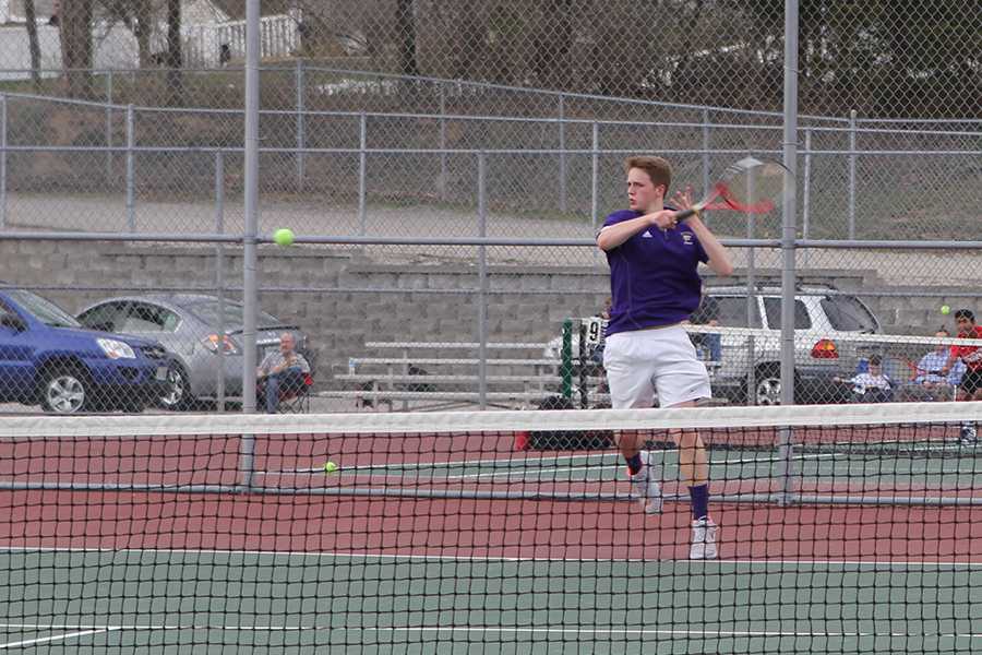 Collin Mayer, #1 player, smashes a forehand against Parkway Central, April 10.