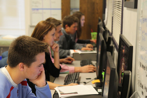 Chris Barnett( 10), Taylor Balleau, Forest Nettles, Nick Hoeflinger and Katie Rippe (12) are all still hard at work despite the end of the school year being so close.