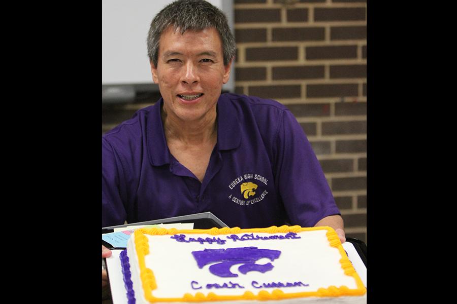 Mr.+Greg+Curran%2C+head+boys+volleyball+coach%2C+poses+with+his+cake+during+Senior+Night+celebrations+after+the+game+against+De+Smet%2C+May+7.