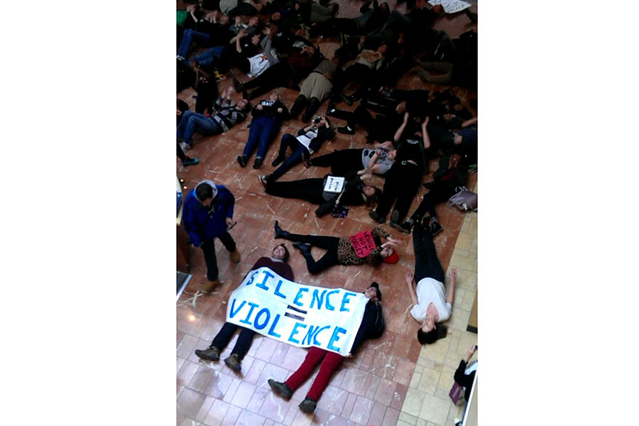 Protesters  in support of Mr. Michael Brown, shooting victim, laid down in the West County Mall on Black Friday for four minutes in representation of the four hours the Ferguson police left Mr. Brown lying dead after he was shot. Nov. 28.