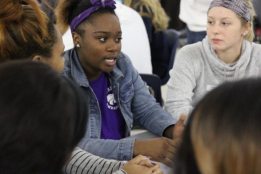 Jabria Spann (12), Kenya Cleaves (12) and Carly Ridings (12) discuss their feelings at the meeting, Dec. 10.