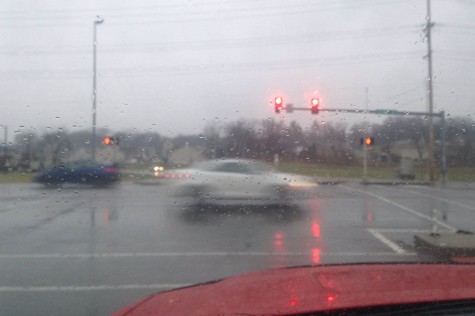 As the cars flew by, I waited and waited... and waited until finally I could cross this death trap of an intersection, Dec. 4. The lights were up and running today, but Tuesday was a whole different story.