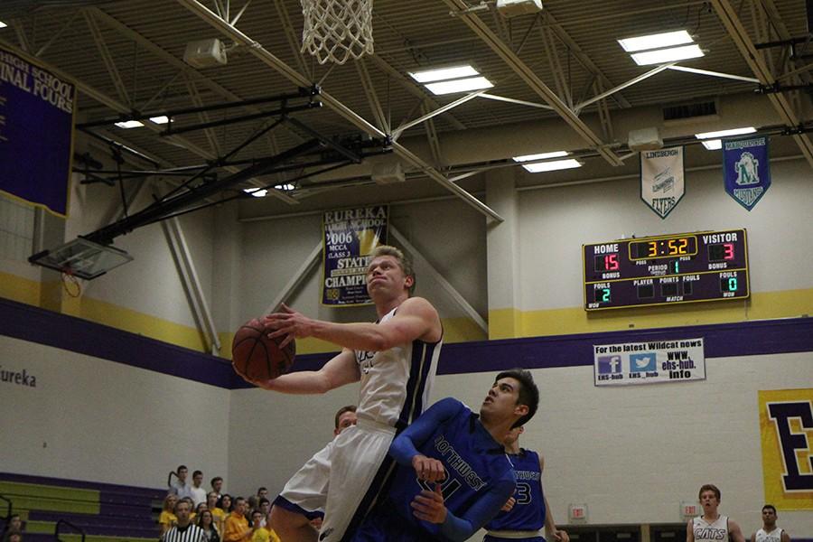 Conner Walden, guard, battles to the rim for a lay-up against Northwest, Feb. 3.