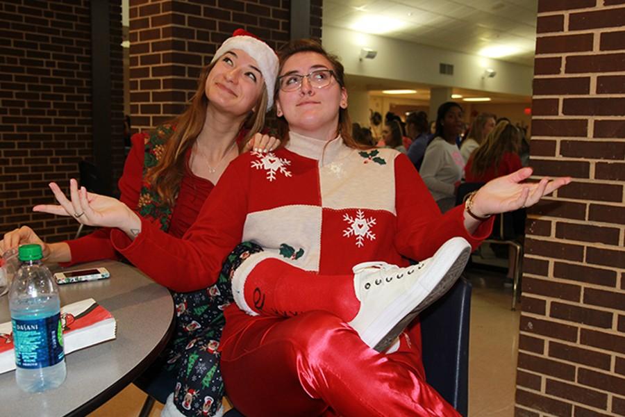 Decked out in in red and green, Sarah Hardin and Olivia Schinsky proudly sport their holiday best,  Dec. 11, 2015.