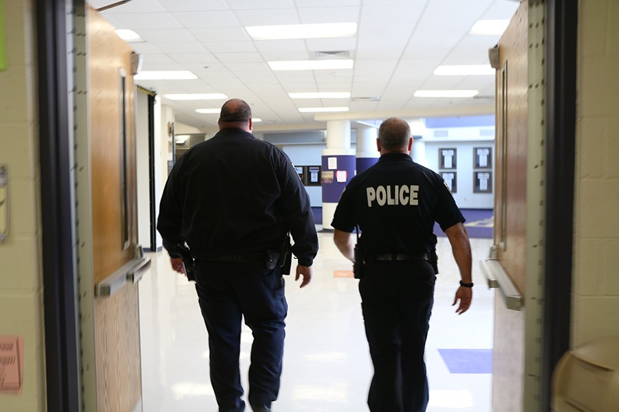 Police officers lend their presence to help people feel safer at school, Feb. 11 and 12.