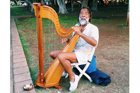 A man played his harp on the side of the street in Maui, March 15. I wish I would have gotten his name. Thats my biggest regret.