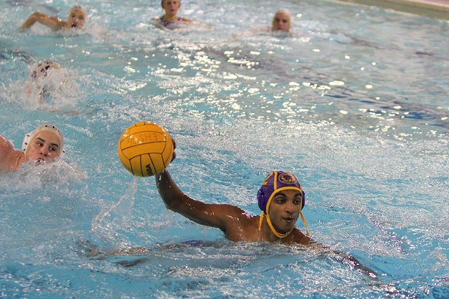Ashwin Garlapaty, varsity water polo, throws the ball in a game against CBC, 4/26.
