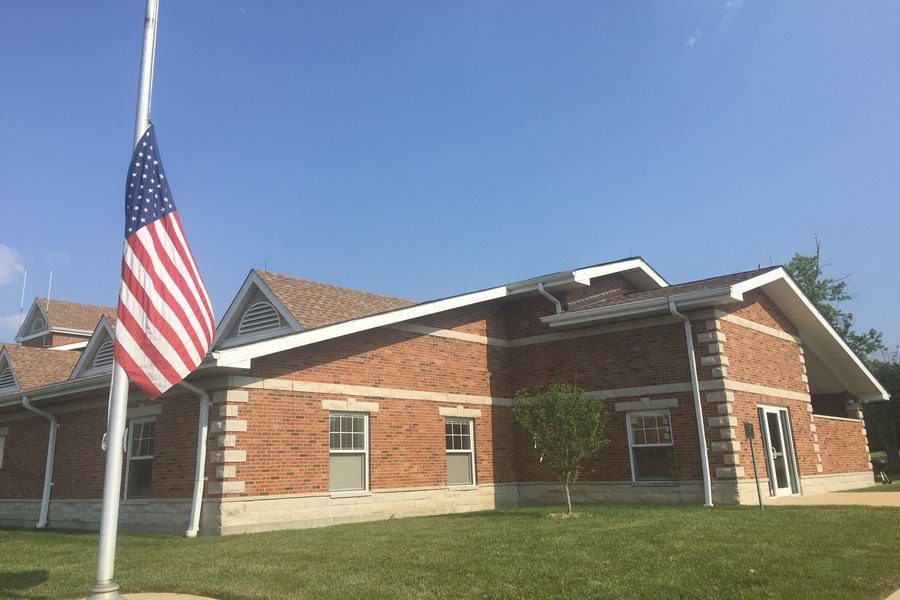 The flag in front of the Metro West Fire Protection District Station 4 is at half staff in honor of the mass shooting in Orlando, Florida, June 12. 