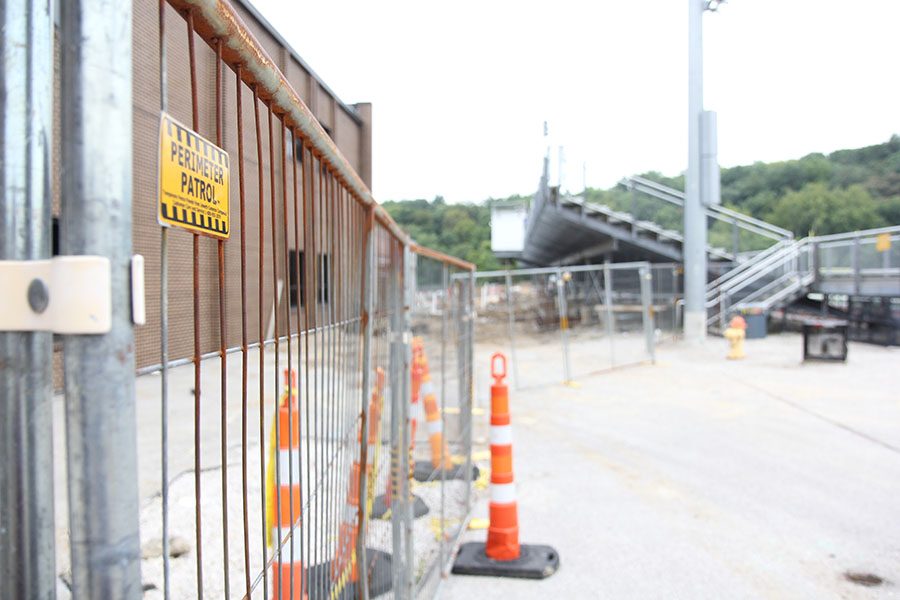 Spectators temporarily have to enter near the tennis courts for home games on the turf field. “Obviously, we’ve had to reroute traffic,” Mr. Gregg Cleveland, activities director, said. “For the home football games, the players have to walk through the wrestling room now to get outside.”