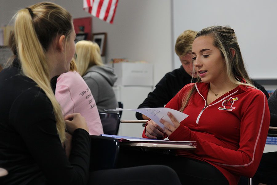 Reviewing in class, Anna Seep (10) looks over her notes in French 2, Oct. 13. “I like to learn about different people and use a different language. It’s interesting,” Seep said. “I think it’s handy especially for college because I think they really look for that.”