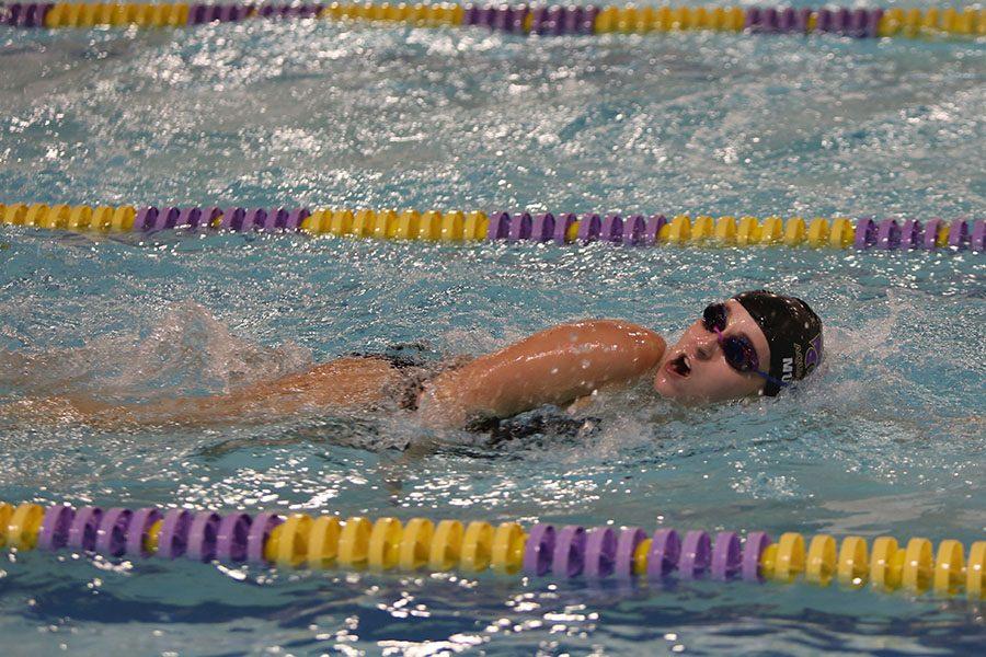 McKinley Munk (9) races to the finish in the free relay during the varsity girls swimming match against Parkway South, Dec. 6. “It’s a lot of fun. The girls on the team are really nice. It’s really enjoyable,” Munk said. “We get along, and we’re getting close together.”