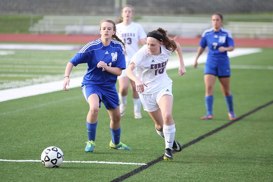 Darting down field, Mary Katheryn Deister, center midfield, helps moves the ball into the offensive zone during the JV soccer game against Northwest, April 13. “We were all trying to win hard, and we all were doing well,” Deister said. “We were all playing well together, which helped us win in the end.” The Wildcats won, 4-0.