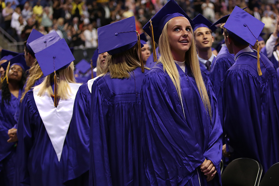 Kelsey Lanham takes a moment to look around at all the people who have supported her throughout her school career during graduation at Chaifetz, May 24.