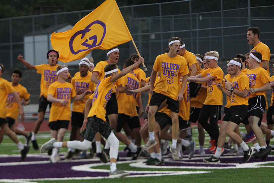 Pumped for the Golden Guys routine, Michael Molengraft gets the crowd fired up during halftime at the 2016 Powderpuff Game, Sept. 29. “We got everybody excited for Golden Guys and danced our butts off,” Molengraft said. “We basically made fun of ourselves, which was funny. Our goal was to be average, and I’m not sure if we ever achieved it, but it was fun. I liked it because there’s nothing else in high school like it.”