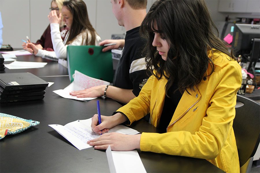 Kaitlyn Schormann (11) participates in an activity in Fashion 3 class inspired by the Rachel’s Challenge assembly, Jan. 5, writing a letter to herself to read in five years. “The letter I wrote was about how I am changing and want to spread kindness throughout my whole life,” Shormann said. “It is just a reminder that I should live my whole life spreading joy. College is going to be hard because I want to go into the fashion industry and will have to make a lot of hard decisions. The letter is reminding me that kindness is a chain reaction. In five years, I might be jobless and in student debt in a horrible mindset, and this letter will show me how the world is full of opportunities. I just need to go through life with an open mind and the intent to spread happiness.” 