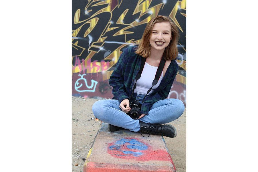 Lily Dean and her camera are  constant companions. She spends many a weekend like this one exploring St. Louis with her friends and taking photos. This photo was taken at the graffiti wall in downtown St. Louis, June 26.