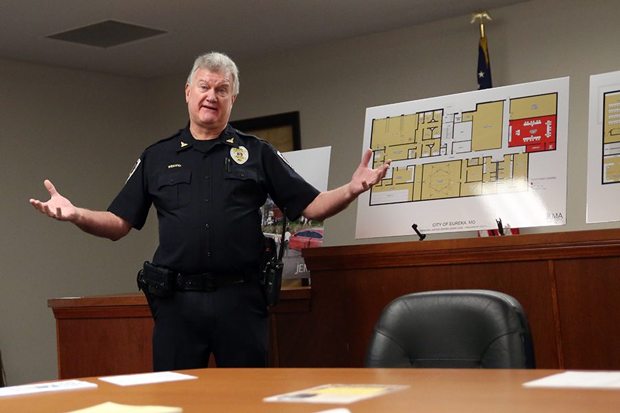 With open arms, Michael Wiegand, Chief of police, discusses plans for a new justice center, Feb. 8.