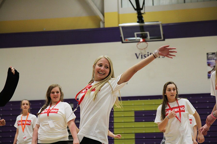 Kathryn Creason (12) gets lost in the music during the Salsa dancing portion of the Spanish Immersion Night in Gym A, March 23.