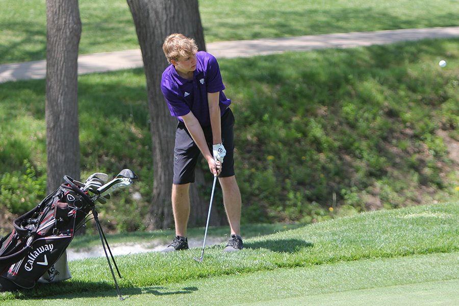 Sectionals in full swing, Tyler Conley (12) tries to get back on the green, May 7. “I enjoy the people on the team more than the actual sport,” Conley said. “If I didn’t have friends like Brigham Zaun on the team, I wouldn’t play at school. He makes it fun, and I mess around with him during the long games. Lafayette was tough competition. The course was hard, and after a while we knew we were going to lose. Everything about the school team is competitive. I would much rather play leisurely.” Conley, Zaun and Jack Moran qualified at sectionals. 