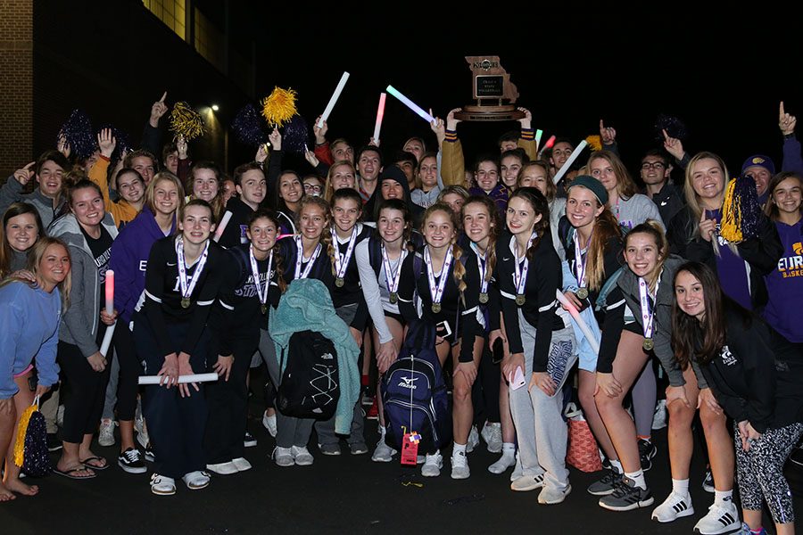 The girls volleyball team poses alongside those who came to celebrate their victory, Nov. 3. 