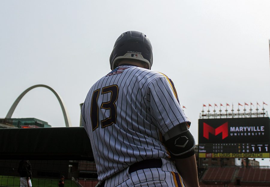 Hunter Mulholland, catcher, gets ready to go hit in Eurekas game against Triad High School at Busch Stadium, April 13. The Wildcats won, 6-3.