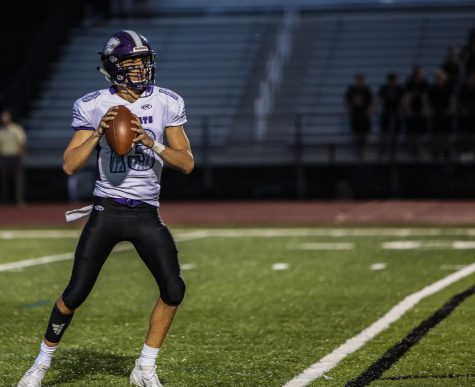 Carter Davis, quarterback, looks to throw a pass during the Eureka vs. Lafayette football game, Sept. 20.
