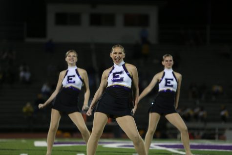 E on her chest, Maddie Bee(11) dances with Golden Line during the Hazelwood Central game, Sept. 13.