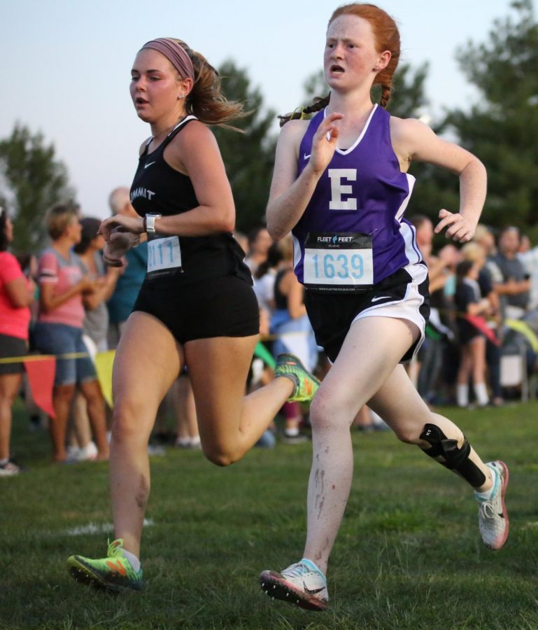 1639 on her stomach, Kyli Smith (10) runs in a Cross Country meet at Pheasant Run Golf Course, Sept. 7. 