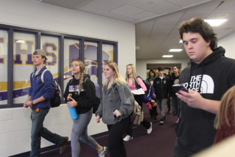 Students walk in the hall without masks during fourth hour, Thursday, Dec. 9.  