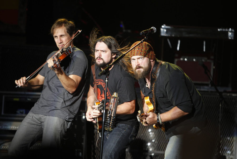 Jimmy De Martini on fiddle, Clay Cook and Zac Brown of the Zac Brown Band perform at Time Warner Cable Music Pavilion at Walnut Creek in Raleigh, North Carolina, Friday, May 11, 2012. (Scott Sharpe/Raleigh News & Observer/MCT)