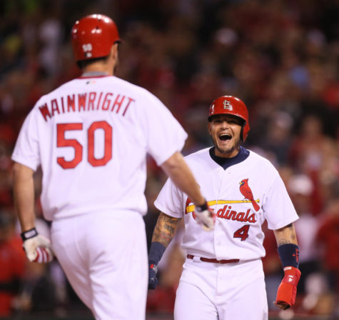 St. Louis Cardinals Yadier Molina reacts as he waits for teammate Adam Wainwright to round the bases after Wainwright drove in Molina with a game-tying three-run home run during the fourth inning on Monday, May 2, 2016, at Busch Stadium in St. Louis. (Chris Lee/St. Louis Post-Dispatch/TNS)
