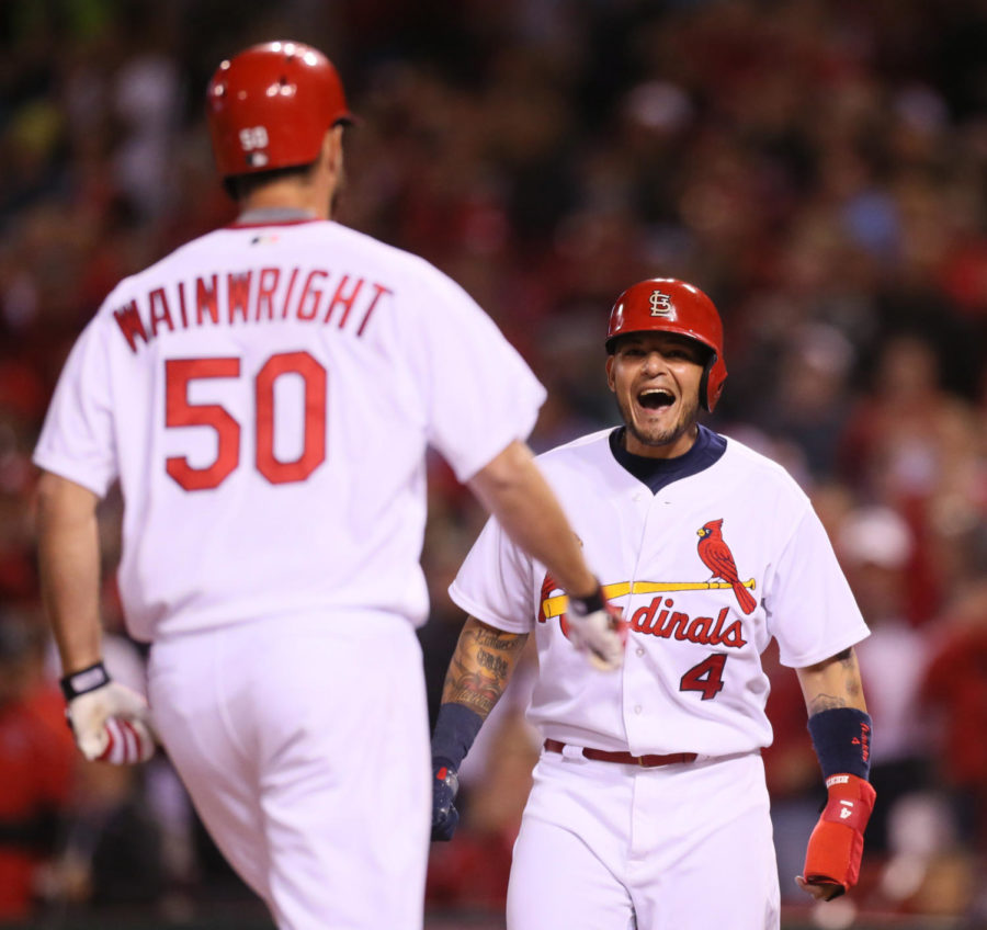 St.+Louis+Cardinals+Yadier+Molina+reacts+as+he+waits+for+teammate+Adam+Wainwright+to+round+the+bases+after+Wainwright+drove+in+Molina+with+a+game-tying+three-run+home+run+during+the+fourth+inning+on+Monday%2C+May+2%2C+2016%2C+at+Busch+Stadium+in+St.+Louis.+%28Chris+Lee%2FSt.+Louis+Post-Dispatch%2FTNS%29
