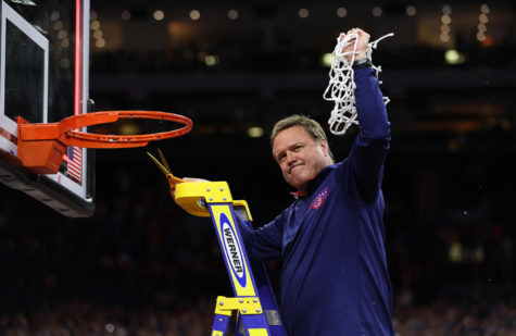 Head coach Bill Self of the Kansas Jayhawks cuts down the net after defeating the North Carolina Tar Heels 72-69 during the 2022 NCAA Mens Basketball Tournament National Championship at Caesars Superdome on April 4, 2022, in New Orleans, Louisiana. (Jamie Squire/Getty Images/TNS)