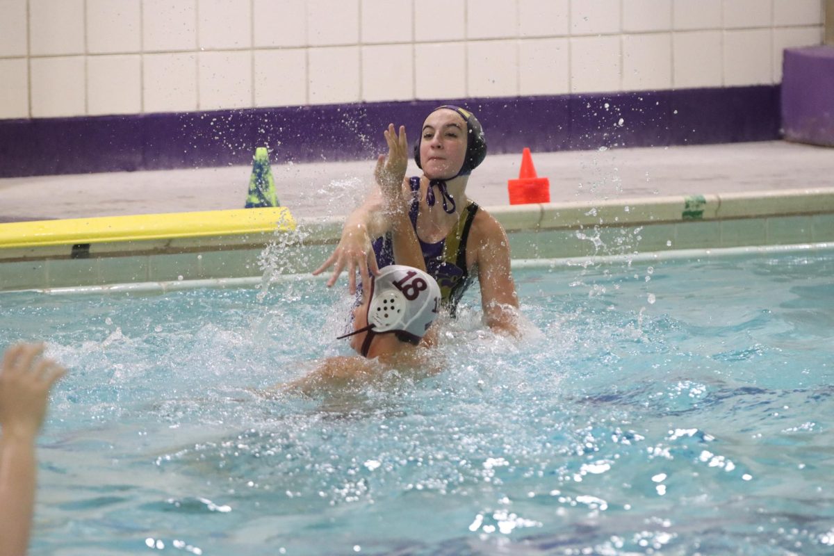 Audrey Kreher, 11, plays water polo.