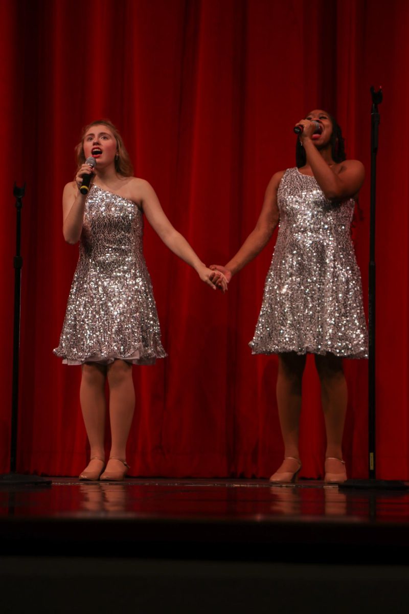 Amelia Thal and Tyina Brewer-Mitchell preform a duet.