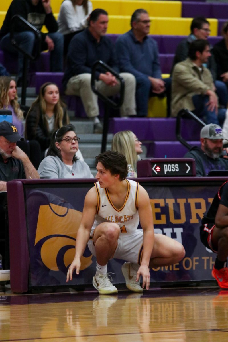 Blake Sitton, 12, waits on the sideline to be subbed in in the battle of 109 game.