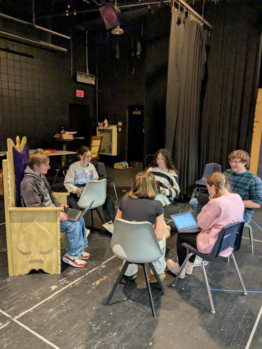 Faith Leonard, 11, Madden Parker, 11, Bobby Lloyd, 12, Natalie Hoffmann, 12, Loralee Lylod, 9, and Hadley Beile, 9, read over lines for their play, "Cassandra's Angels."
