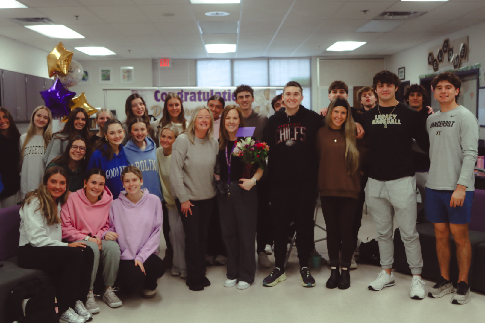 Goodman congratulated by Rogan's 1st hour Digital Media class and EHS Hub leadership